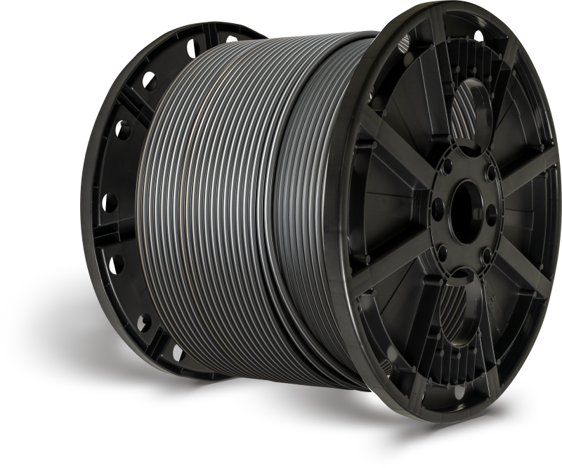 grande bobine noire avec bobine grise enroulée autour